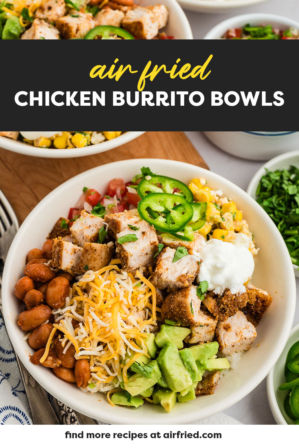 Burrito chicken bowl with jalapenos and shredded cheese.