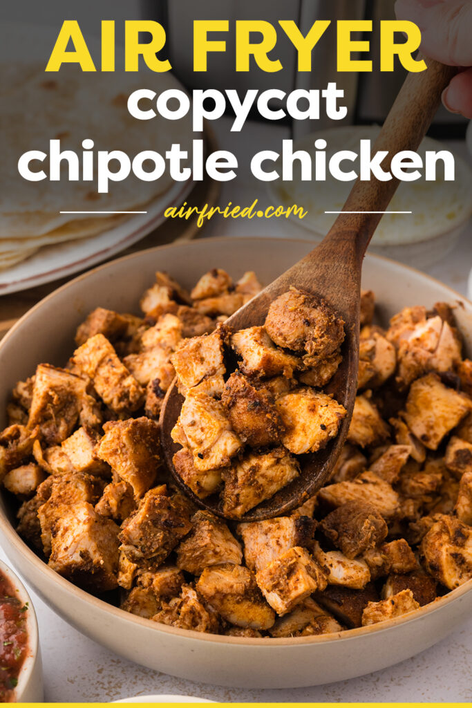 A bowl full of cooked Chipotle chicken.