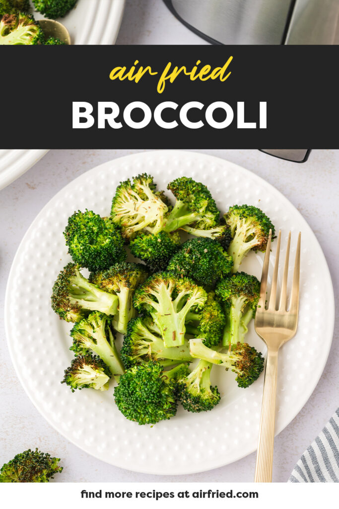 Ar fried broccoli on a plate with fork.