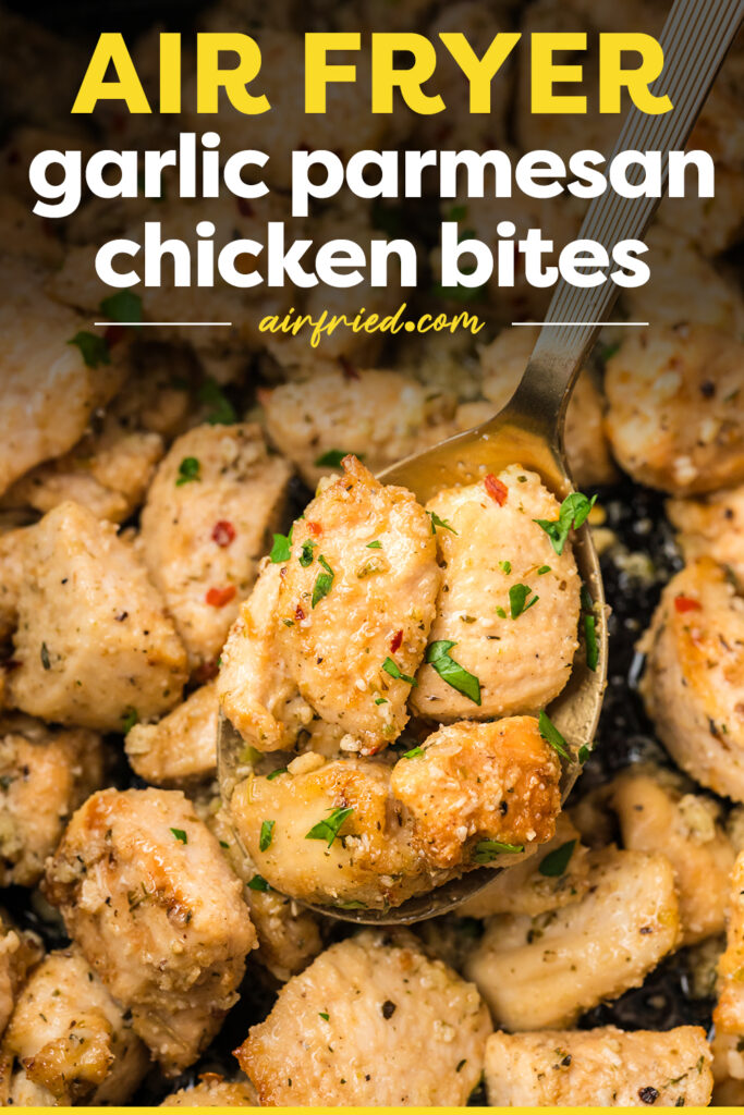 A close up of a spoonful of chicken bites.