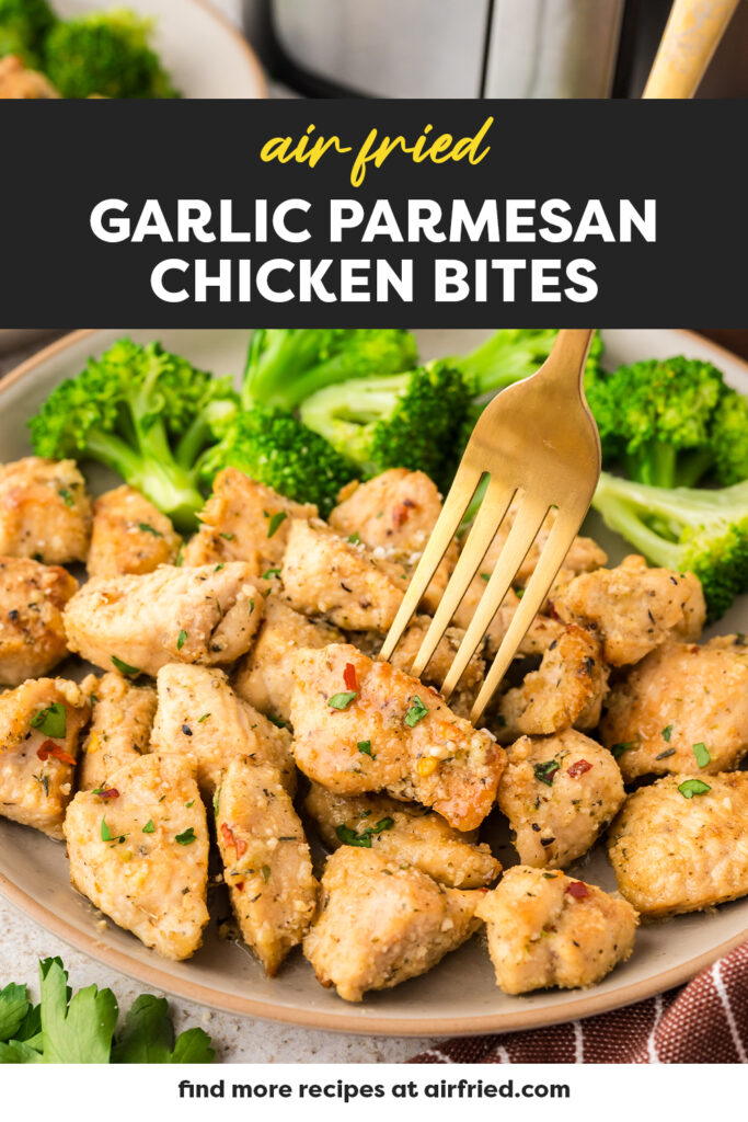 A fork stabbing into a piece of cooked chicken.