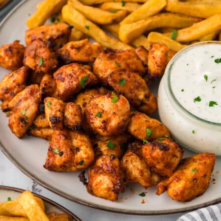 Close up of chicken bites on a plate.