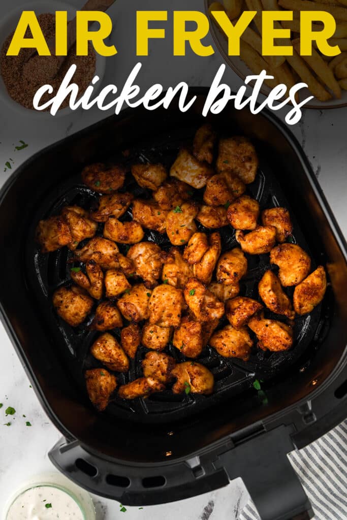 Air fryer full of cooked chicken bites