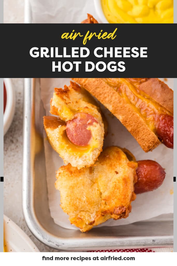 Overhead view of grilled cheese hot dog split in half.