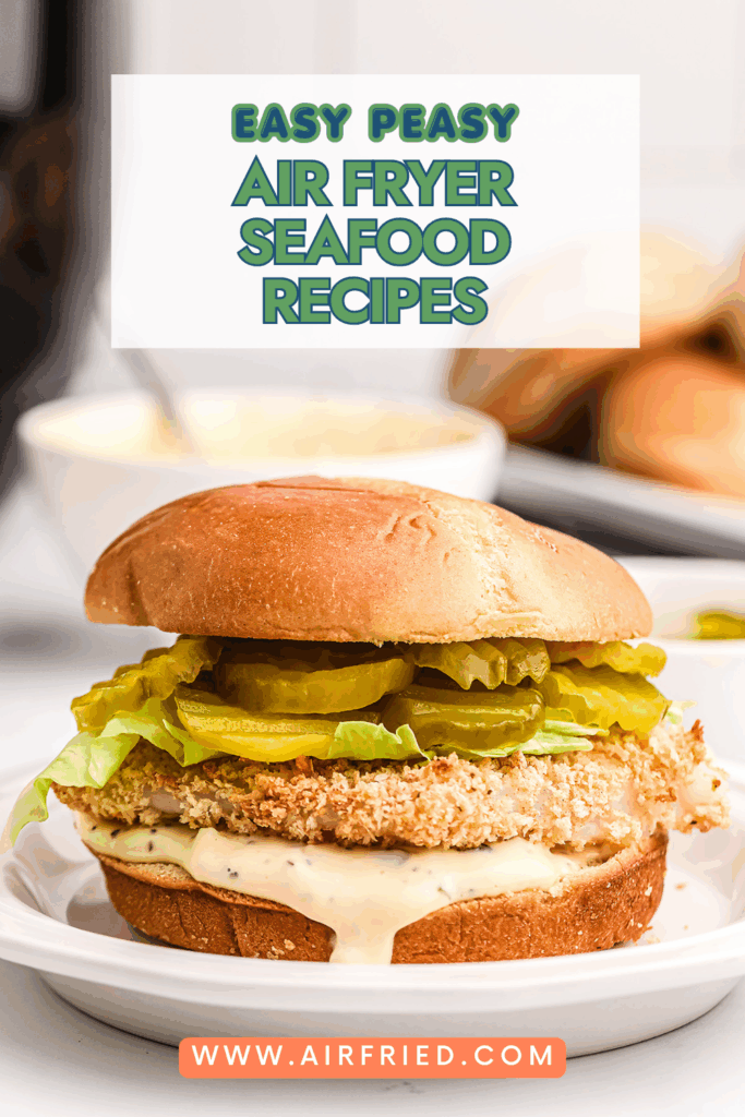 Air fryer fish sandwich on plate with text for pinterest.